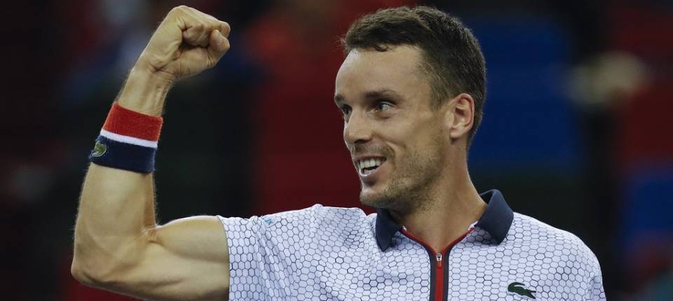 Bautista celebrando su victoria ante Tsonga en el Masters de Shangi 2016