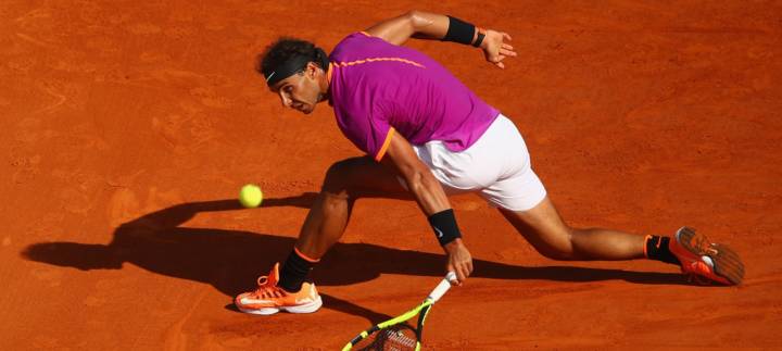 Rafa Nadal es uno de los tenistas con mayor destreza a la hora de "saber resbalar" en pistas de tierra batida (C) Clive Brunskill/Getty Images Europe